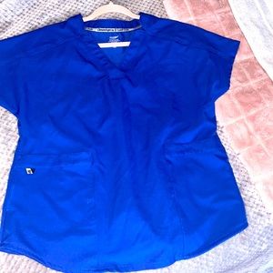 Brand new never worn. Women’s royal blue scrub top medium